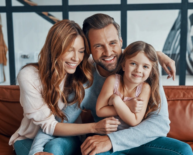 Happy family smiling together at Polished Smiles of Round Rock in Round Rock TX