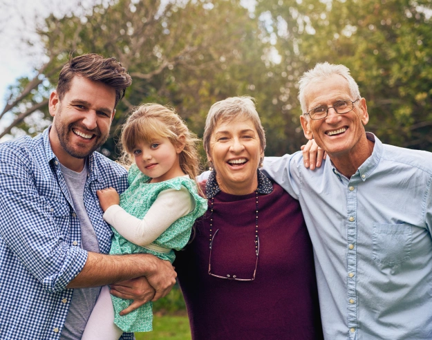 Happy multi generational family smiling together receiving general dentistry services at Polished Smiles of Round Rock in Round Rock TX