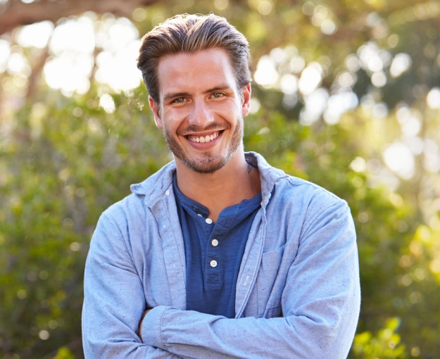 Man smiling after receiving restorative dentistry treatment at Polished Smiles of Round Rock in Round Rock TX